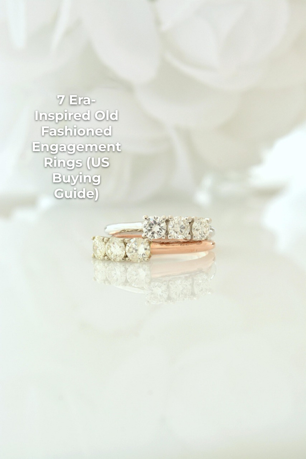 Old Fashioned Engagement Rings in White and Rose Gold Old fashioned engagement rings with two diamond bands in white and rose metal on a reflective surface