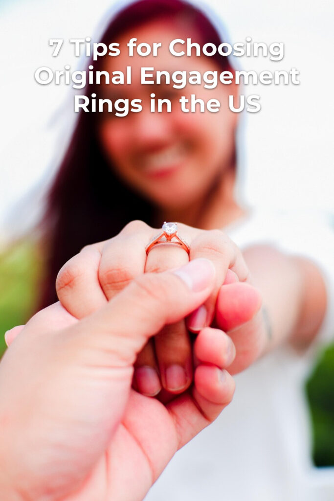 Original engagement rings shown as two people hold hands, with woman in white top blurred in background