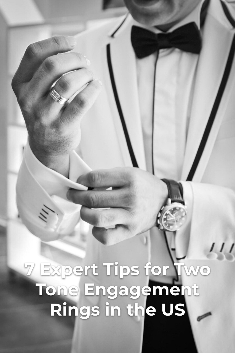 Two tone engagement rings: man in white tuxedo adjusts cuff, showing ring and wristwatch