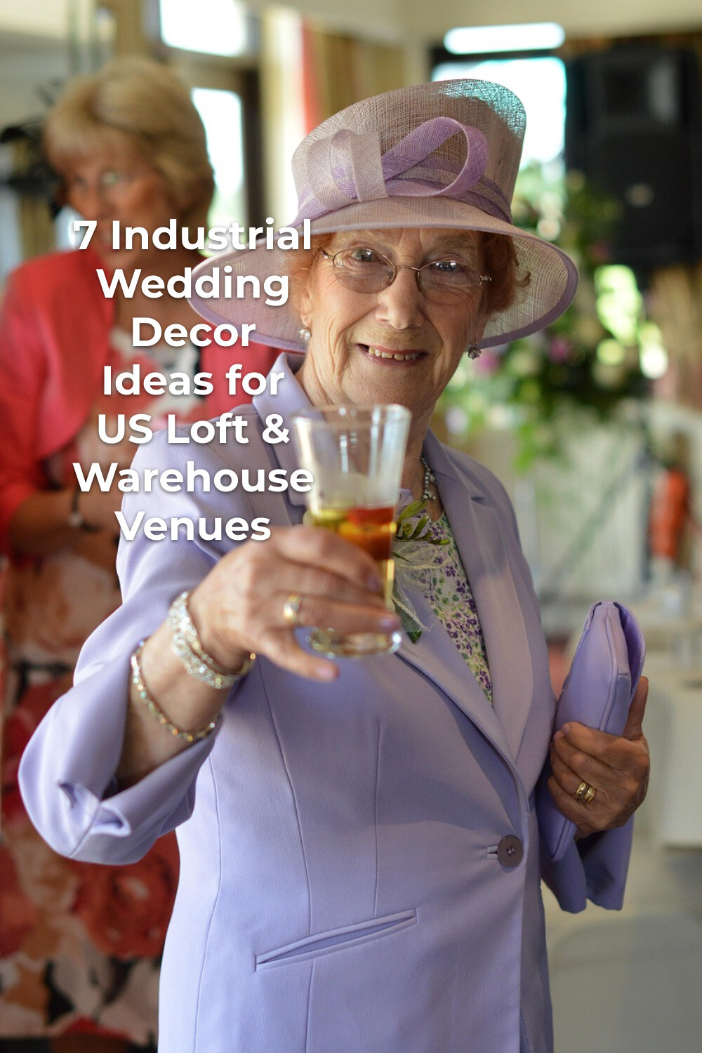 Elderly guest in lavender suit and hat toasts indoors, editorial industrial wedding decor scene