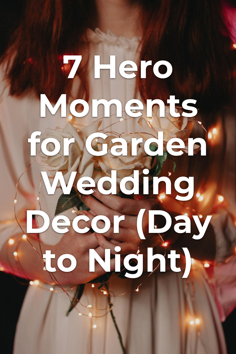 Romantic garden wedding decor with white roses garden wedding decor: person in a light dress holding white roses wrapped with delicate string lights