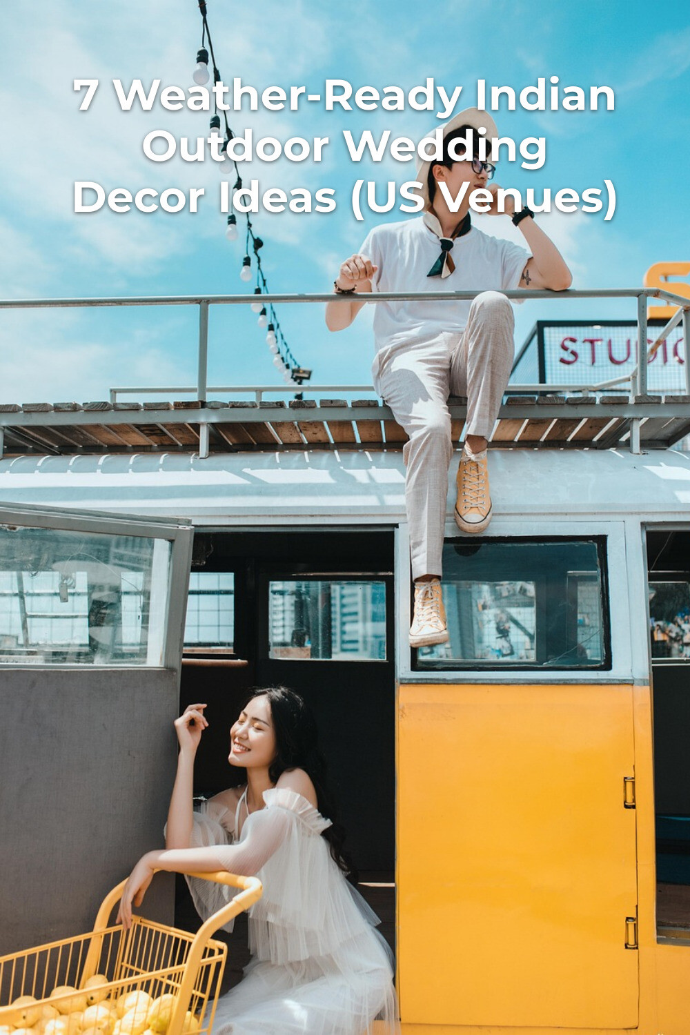 Indian outdoor wedding decor inspiration with couple on yellow vehicle and shopping cart in a practical scene