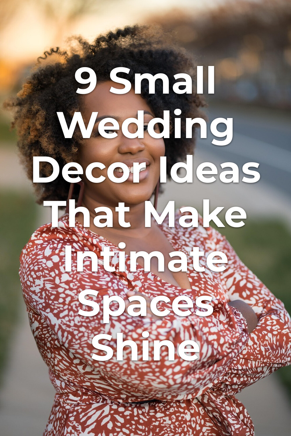 Woman with curly hair in patterned dress outdoors, intentional small wedding decor inspiration