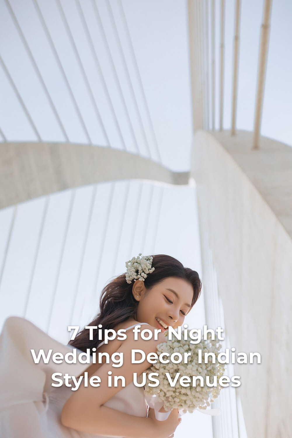 Night wedding decor indian inspiration: woman holding white flower bouquet under a bridge at night