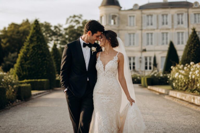 Wedding photo gallery featuring a romantic estate ceremony with the couple in soft natural light and elegant floral details