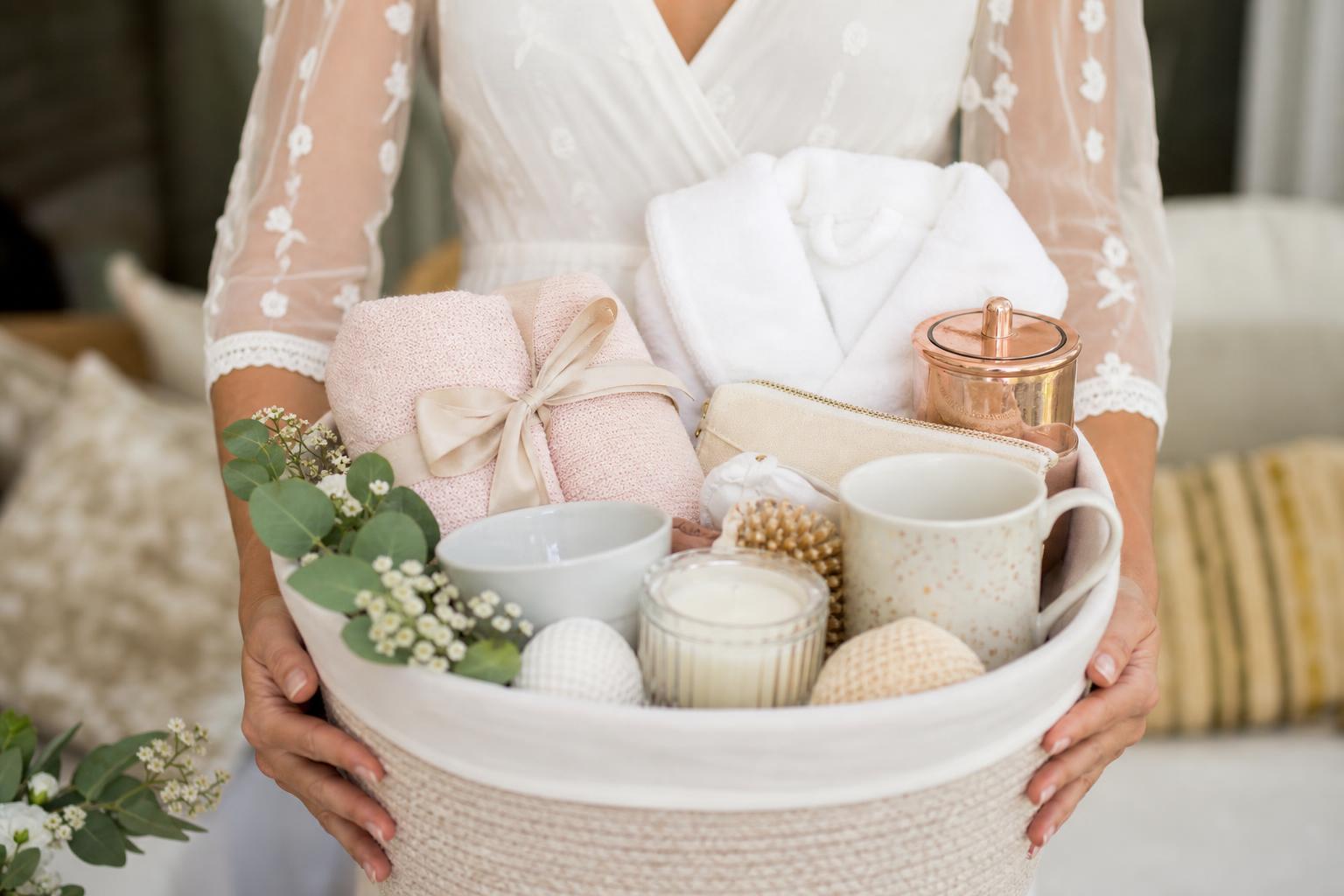 Bridal shower basket ideas with elegant themed gifts arranged in a polished woven basket
