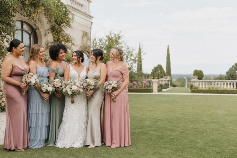 bridal party dresses in a coordinated garden wedding palette