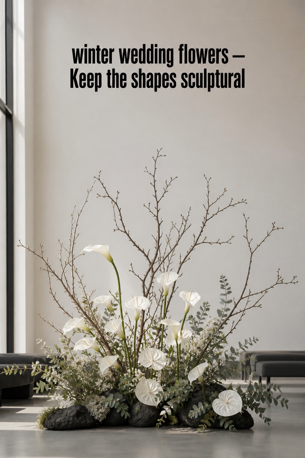 winter wedding flowers sculptural installation with calla lilies and bare branches
