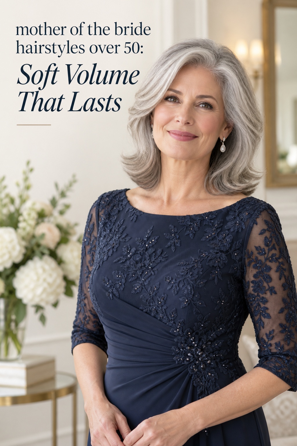 mother of the bride hairstyles over 50 with soft silver volume and a navy dress